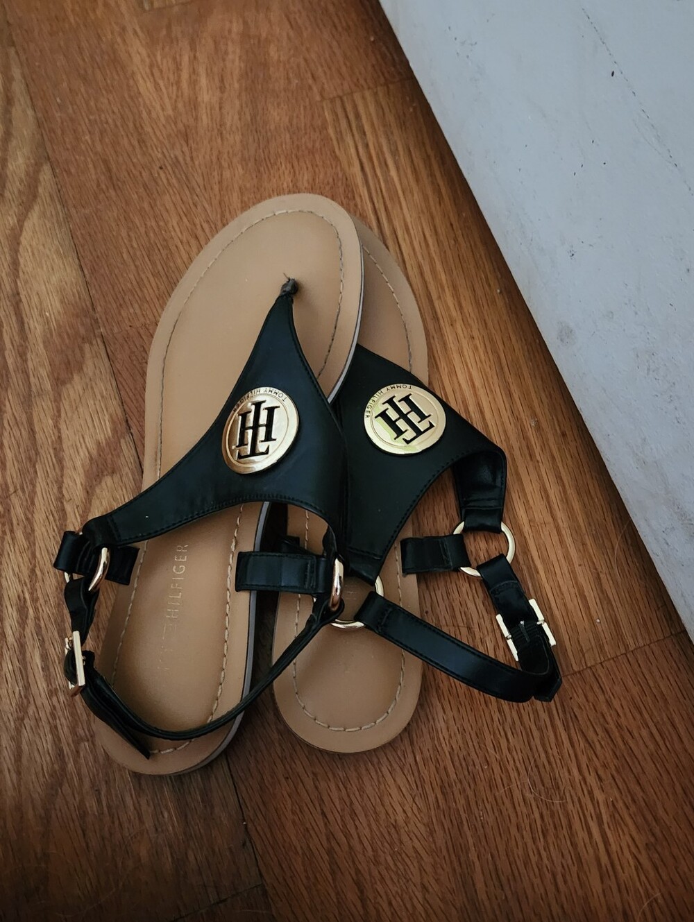 Tommy Hilfiger Black Leather Sandals with Gold Logo Medallions